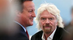 Richard Branson, right, and Virgin ordered a dozen Airbus A350-1000s, valued at $4.4 billion, Monday at the Farnborough International Airshow.