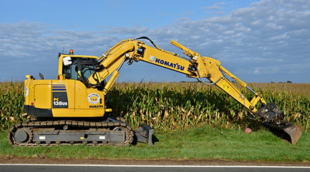 A Komatsu PC138 US at work on a roadside. Komatsu will spend more than $3.5 million, including debt, to acquire Milwaukee-based Joy Global.