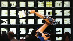 Visitors watch a Kuka robot perform precise movements as part of the Robochop interactive robot installation at the 2015 CeBIT technology trade fair in Hanover Germany Visitors watch a Kuka robot perform precise movements as part of the Robochop interactive robot installation at the 2015 CeBIT technology trade fair in Hanover Germany