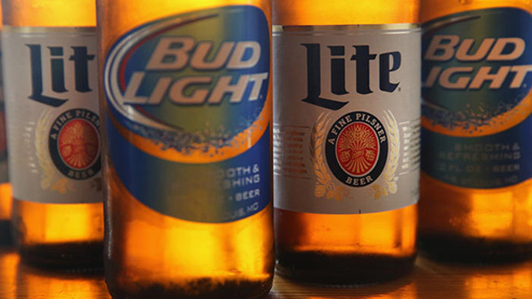 Bottles of Bud Light and Miller Lite made by AB InBev and SABMiller