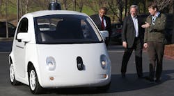 Google&apos;s Chris Urmson, right, showed a Google self-driving car to U.S. Transportation Secretary Anthony Foxx, left, and Google Chairman Eric Schmidt, center, at the company&apos;s headquarters in 2015.
