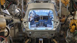 Robots weld Volkswagen Tiguan vehicles at the VW factory in Wolfsburg, Germany.