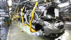 Peugeot cars on the line in Mulhouse France Peugeot cars on the line in Mulhouse France