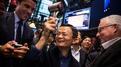 Alibaba founder and executive chairman Jack Ma bangs the gavel at the New York Stock Exchange as Alibaba stock goes live at IPO in September 2014. The company grew more in the last quarter than at any point since that IPO.