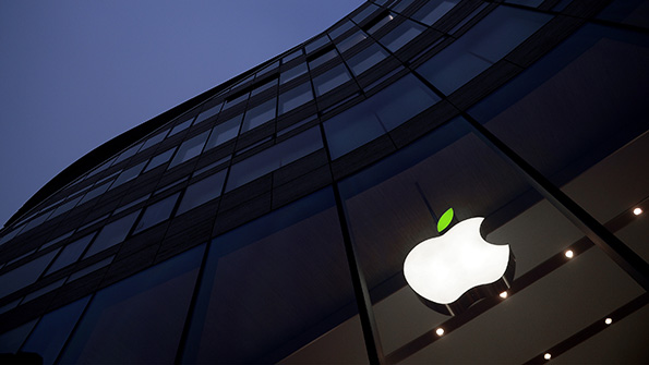 The Apple logo on the side of a building