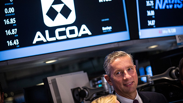 Alcoa CEO Klaus Kleinfeld rings the bell on the New York Stock Exchange