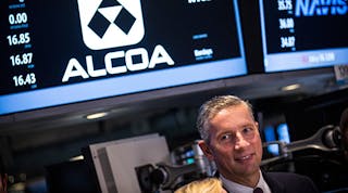 Alcoa CEO Klaus Kleinfeld rings the bell on the New York Stock Exchange.