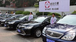 Chauffeurs in China await bookings on the ride-sharing app Didi.