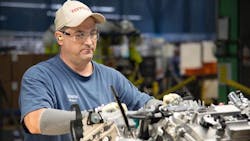 Team member Robert Sizemore readies a 6cylinder engine on the final assembly line Sizemore has worked at Toyota West Virginia for more than 16 years Team member Robert Sizemore readies a 6cylinder engine on the final assembly line Sizemore has worked at Toyota West Virginia for more than 16 years