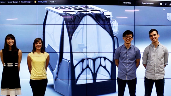 UIUC Project AME team members from left to right Sharon TsubakiLiu Naomi Audet Kevin Kim and Andrew Peterman stand next to their winning design not pictured Luke Meyer