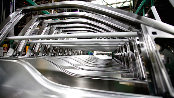 Aluminum doors for the Ford F150 wait in line at Ford39s Dearborn Mich assembly plant