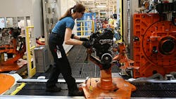 A worker at a Ford plant A worker at a Ford plant