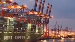 A China Shipping Line container ship in the Hamburg Germany port A China Shipping Line container ship in the Hamburg Germany port