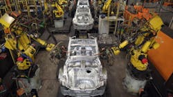 Robotic arms assemble and weld the body shell of a Nissan car on the production line at Nissan39s Sunderland plant in England Robotic arms assemble and weld the body shell of a Nissan car on the production line at Nissan39s Sunderland plant in England