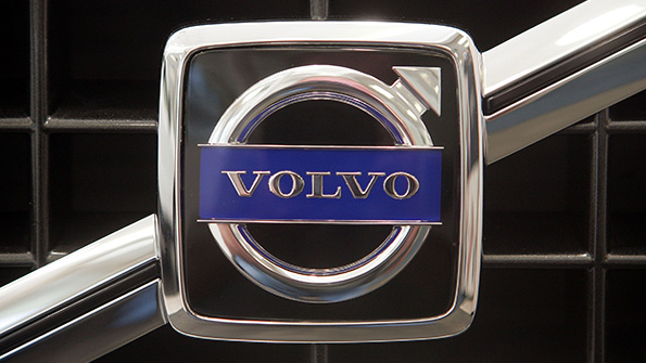 The Volvo logo on the grille of a car