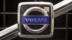 The Volvo logo on the grille of a car