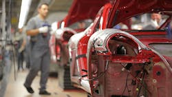 Au auto worker on the factory floor Au auto worker on the factory floor