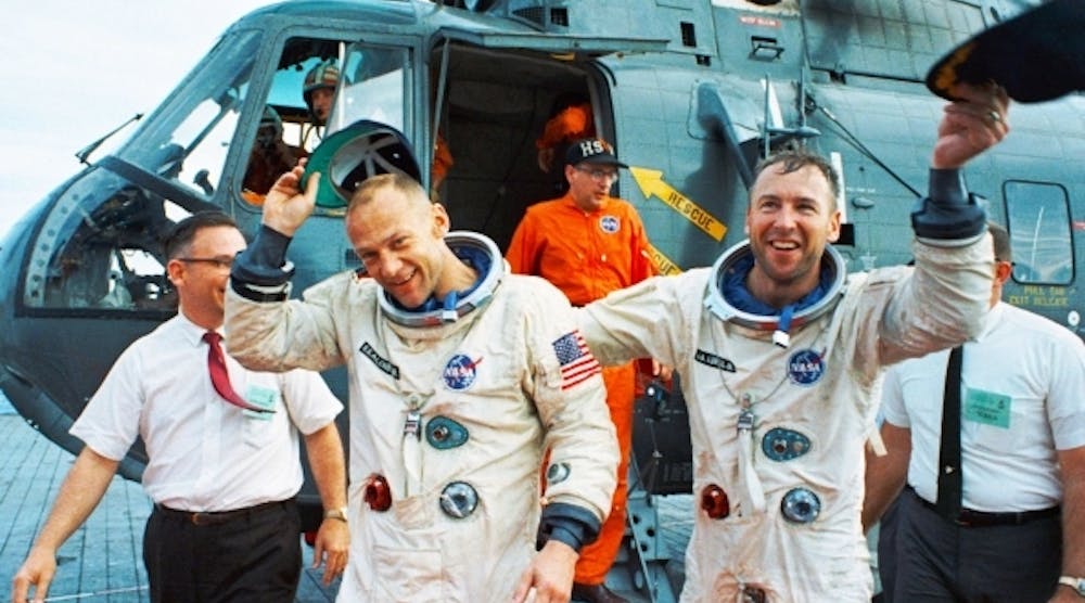 Co-pilots Jim Lovell and Buzz Aldrin celebrate after the Gemini XII splashdown on November 15, 1966.