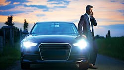 A luxury sedan with Philips Lumileds bulbs in the headlights A luxury sedan with Philips Lumileds bulbs in the headlights