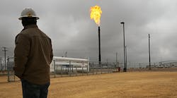 Flared natural gas burns off at Apache Corporations operations at the Deadwood plant in the Permian Basin in Texas.