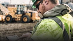 A worker utilizes Caterpillar software on an industrialstrength tablet A worker utilizes Caterpillar software on an industrialstrength tablet