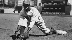 While confronted by racism and bigotry Robinson overcame the odds by focusing on resultsmdashscoring and winning games While confronted by racism and bigotry Robinson overcame the odds by focusing on resultsmdashscoring and winning games