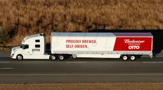 Who&rsquo;s behind the wheel? Nobody, actually, as autonomous vehicle technology pilots an Anheuser-Busch truck along a Colorado interstate.