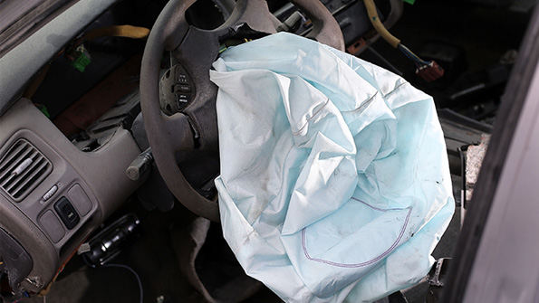 A deployed Takata airbag in a 2001 Honda Accord