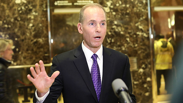 Boeing CEO Dennis Muilenburg talks with the media at Trump Tower
