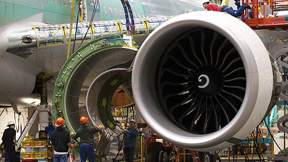 Boeing workers assemble an airliner engine in Washington