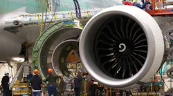 Boeing workers assemble an airliner engine in Washington