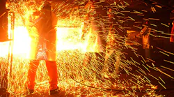 Molten steel is shaped into billets at the TAMCO mini mill in California
