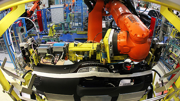 A Kuka AG industrial robot at a German Mercedes assembly plant