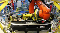 A Kuka AG industrial robot at a German Mercedes assembly plant