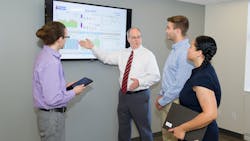 SherwinWilliams CIO Tom Lucas second from left talks with IT apprentices from left David Diemert Tyler Cronie and Daniella Pomales SherwinWilliams CIO Tom Lucas second from left talks with IT apprentices from left David Diemert Tyler Cronie and Daniella Pomales