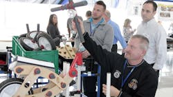 Guests participate in a bike build training simulation to teach workplace organization skills Guests participate in a bike build training simulation to teach workplace organization skills