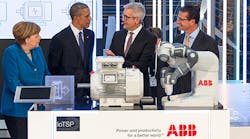 President Obama and German Chancellor Angela Merkel listen to ABB CEO Ulrich Spiesshofer and Greg Scheu (far right), president of ABB&rsquo;s Americas region, discuss how a new smart sensor can connect low-voltage motors to the internet and improve productivity.