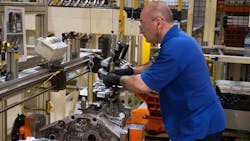 An employee at Ford39s Dagenham England facility works on assembly of a diesel engine Ford designs and engineers gasoline and diesel engines in the UK that go into half of all Ford vehicles An employee at Ford39s Dagenham England facility works on assembly of a diesel engine Ford designs and engineers gasoline and diesel engines in the UK that go into half of all Ford vehicles