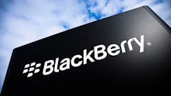 The BlackBerry wordmark on a black sign against a cloudy sky The BlackBerry wordmark on a black sign against a cloudy sky