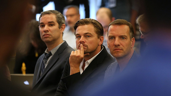 Leonardo DiCaprio center attends a DivestInvest news conference last month