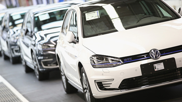 VW sedans come off the line at the companys Wolfsburg Germany facility