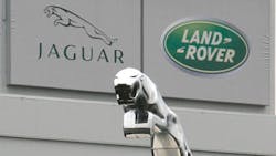 Jaguar and Land Rover logos and an oversized hood ornament Jaguar and Land Rover logos and an oversized hood ornament