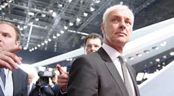 Volkswagen AG CEO Matthias Mueller walks the floor of the Geneva Motor Show in Switzerland.