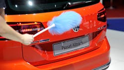 A VW Passat is cleaned at the Geneva Auto Show A VW Passat is cleaned at the Geneva Auto Show