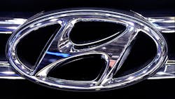 Hyundai logo on a car grille Hyundai logo on a car grille