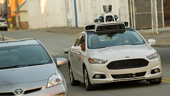 A selfdriving Ford Fusion traverses one of the flatter roads in Pittsburgh