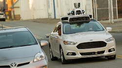 A self-driving Ford Fusion traverses one of the flatter roads in Pittsburgh earlier this month.