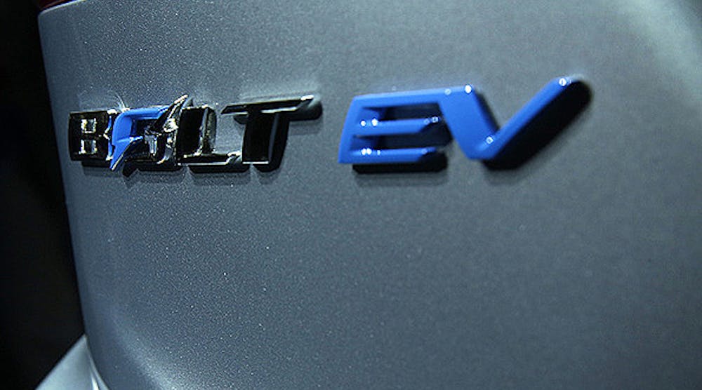 Manufacturers of electric vehicles, like the Chevrolet Bolt EV pictured here, will benefit as battery costs continue to decline, according to a report.