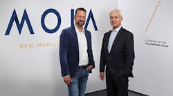 Moia head Ole Harms, left, and Volkswagen AG CEO Matthias Mueller introduce the new electric car brand.