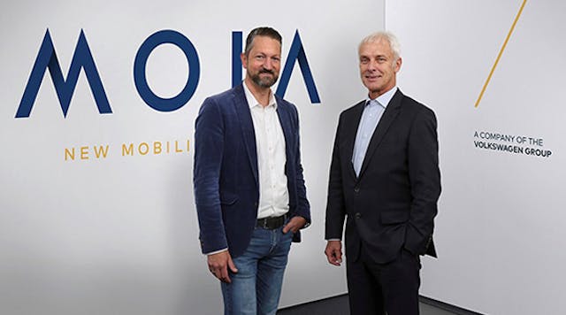 Moia head Ole Harms, left, and Volkswagen AG CEO Matthias Mueller introduce the new electric car brand.